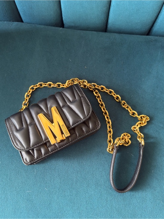 Moschino Handbags - Authentic Moschino Black Quilted Leather Crossbody with Gold 'M' Logo and Chain